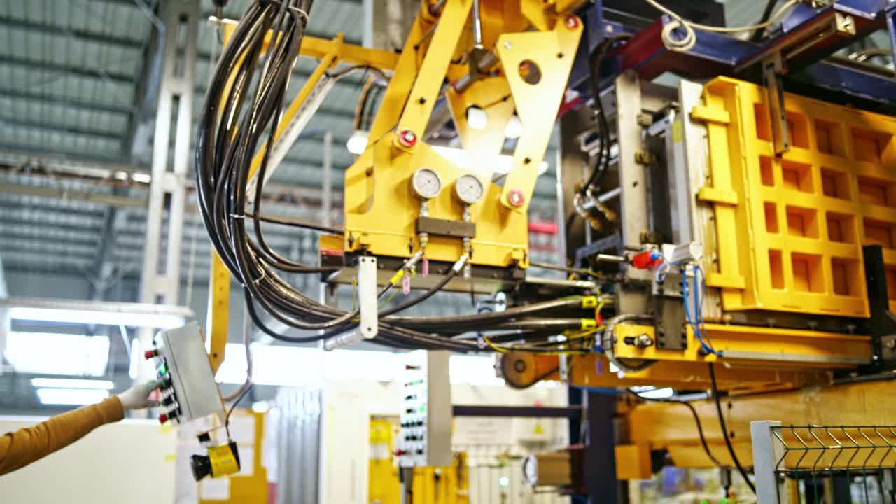 Typical production industrial equipment. Robotic factory line for processing and quality control