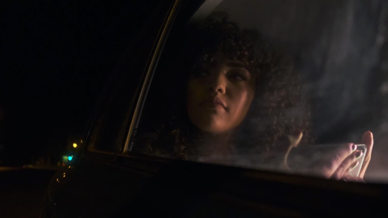 Woman in Car at Night