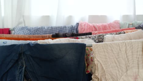 clothes drying on a clothesline indoors