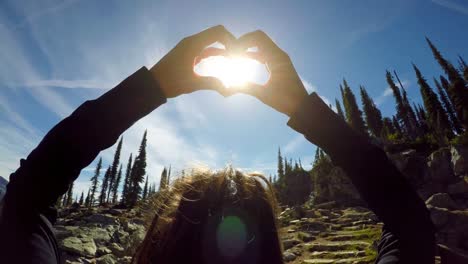 woman gesturing against sun 4k