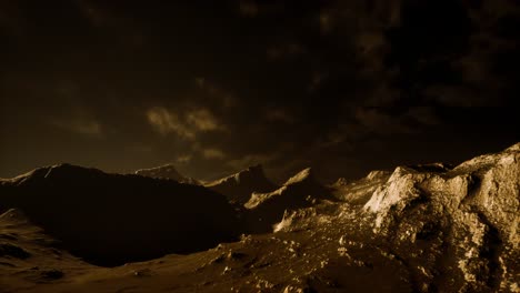 Dark-clouds-over-volcanic-valley-with-grass-and-rocks