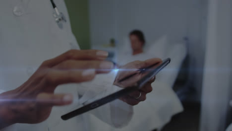 animation of light trails over african american female doctor using tablet