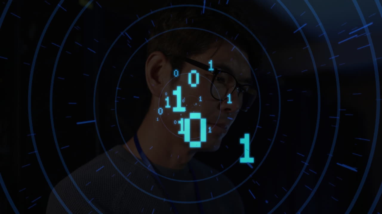 At school, animation overlaying binary code on person working on computer