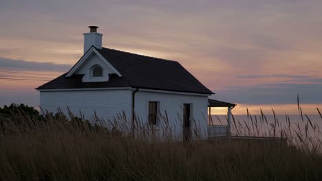 coastal cottage at sunrise