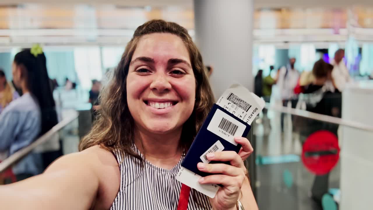 Happy Woman Takes Selfie with Passport at Airport Gate