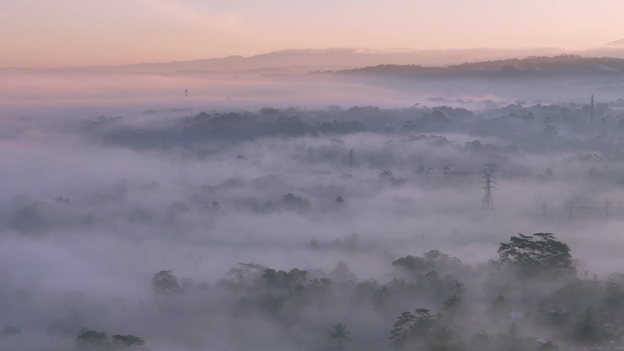A foggy morning over the indonesian countryside