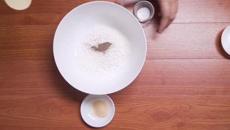 Top-view-flour-with-spices-in-white-bowl