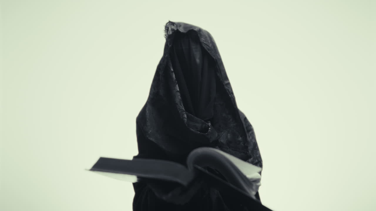 Mysterious Figure Reading a Book