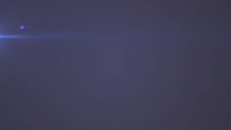 Animation-of-beam-of-light-and-bokeh-spot-of-blue-light-on-dark-background