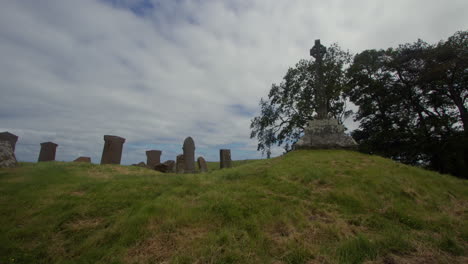 extra wide shot of kirkmadrine chapel west door and graveyard