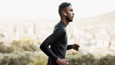 Athlete,-earphones-and-running-in-urban-nature