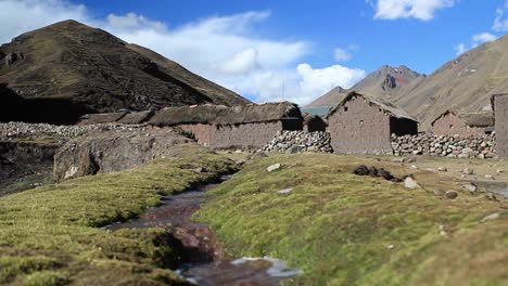 village backside with bubbling brook