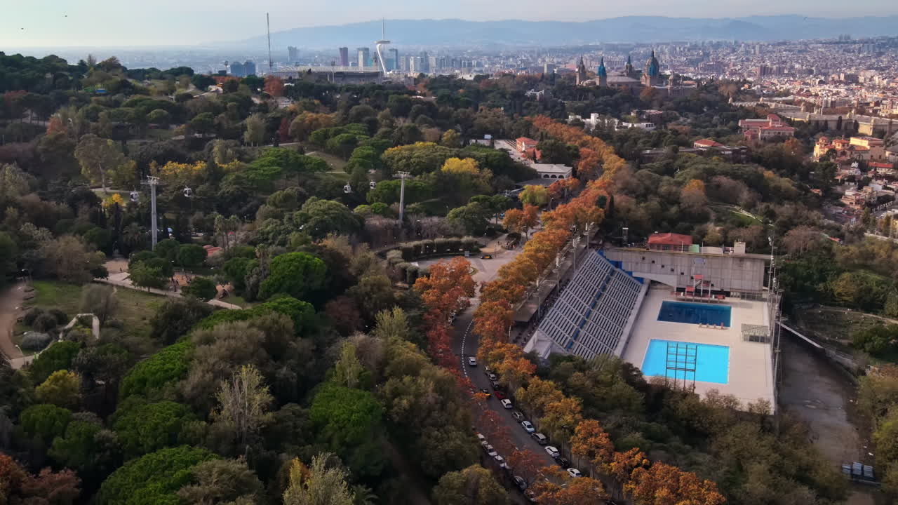 Aerial drone view of Montjuic hill streets in Barcelona. Sunny day. Spain