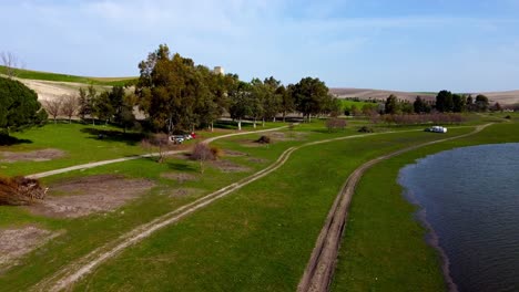 Aerial-view-of-the-coastal-area-of-the-reservoir-torre-del-agruila,-sevilla,spain