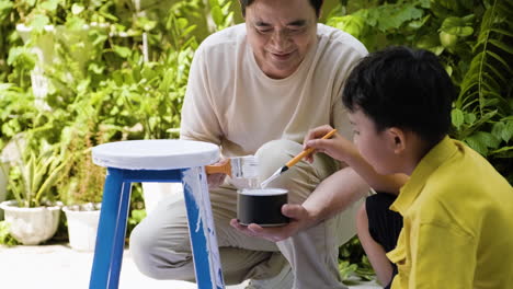 asian man and boy in the backyard