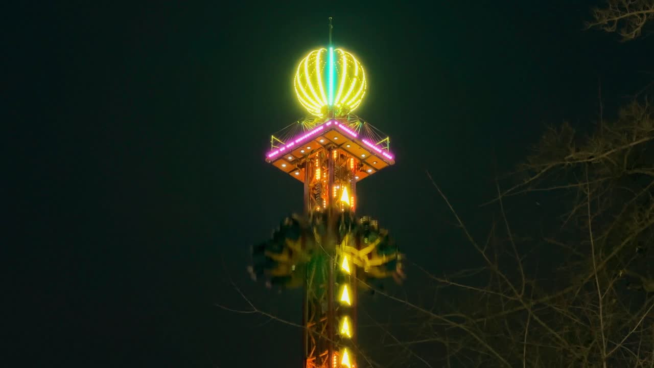 Static view of the top of the xtreme fall amusement park ride where a group of people fall into the void, Santiago, Chile.