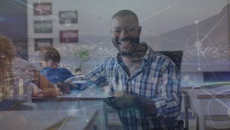 animation of network of connections over happy african american male teacher at school