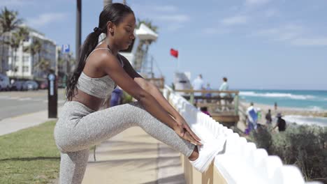 Woman-stretching-at-the-fence