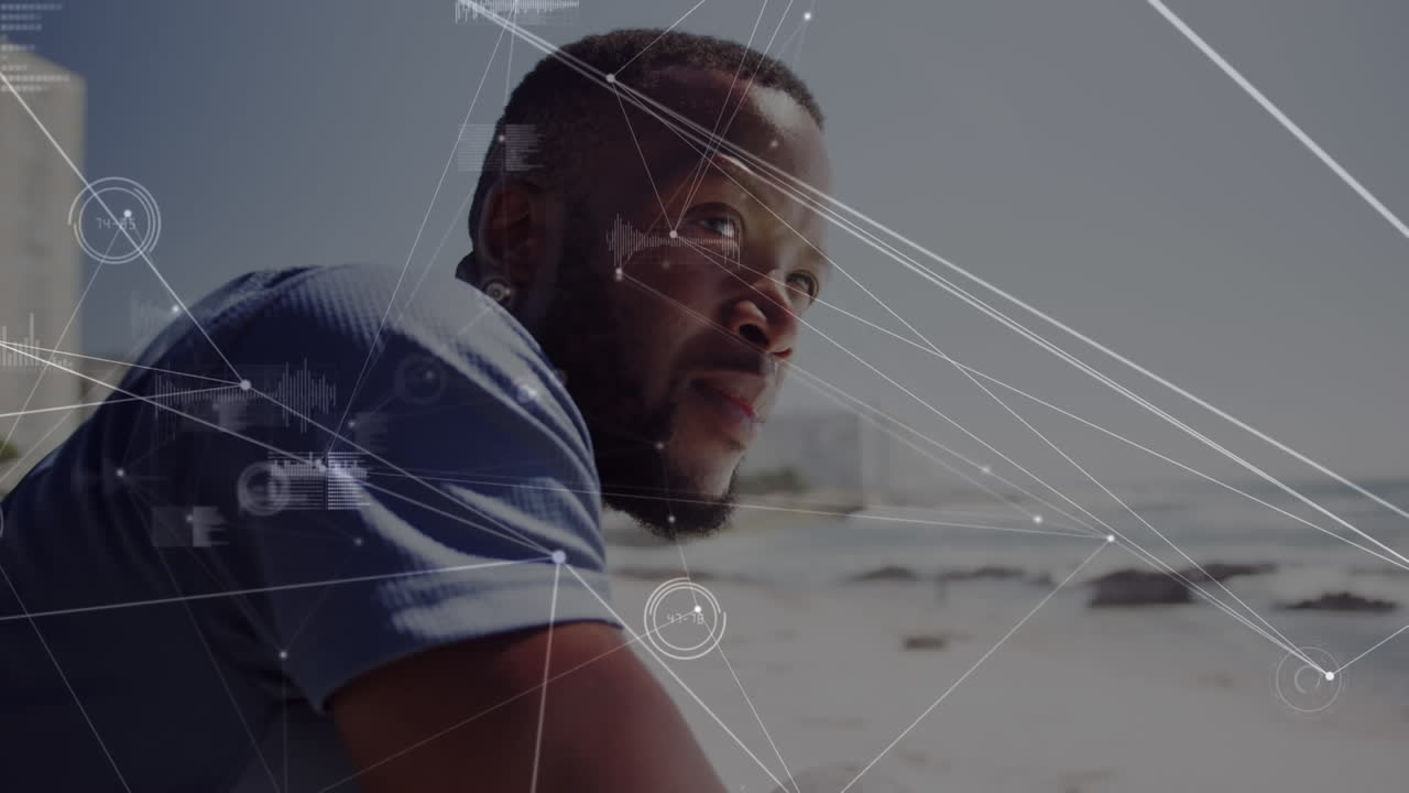 Network of connections and data processing over african american man enjoying the view at the beach