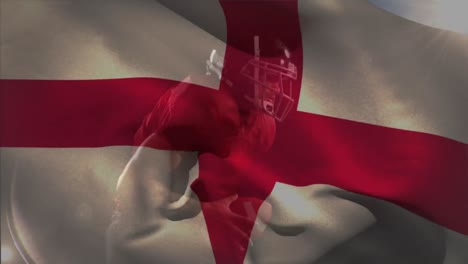 animación de la bandera de inglaterra sobre un jugador de fútbol americano caucásico