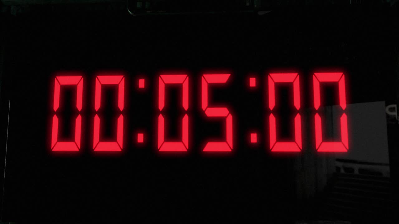 High quality CGI render of a digital countdown timer on a wall-mounted screen, with glowing red numbers, counting down from 10 to zero, with with camera slowly pushing in dramatically