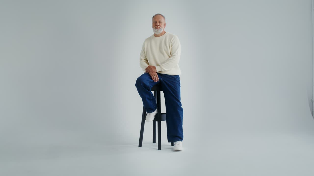 Stylish Elderly Man Posing in Studio