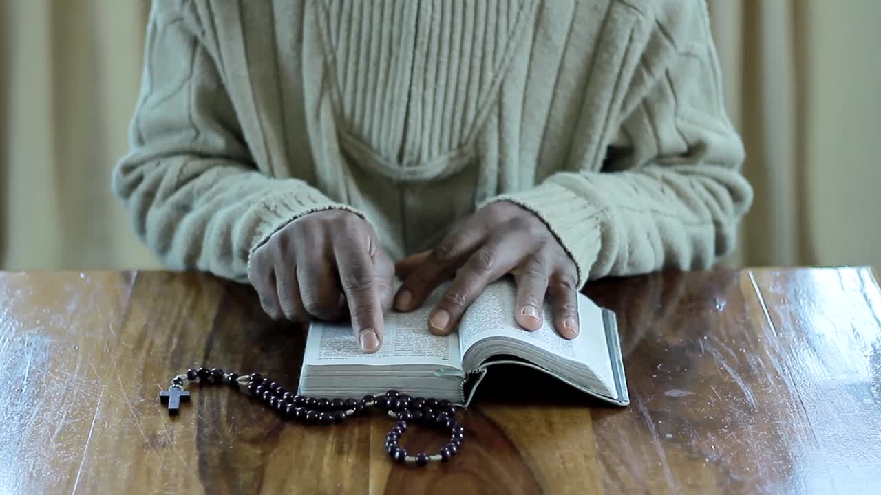 praying to God with bible faithfully worshipping with people stock footage stock video
