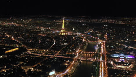 city of paris by night aerial view