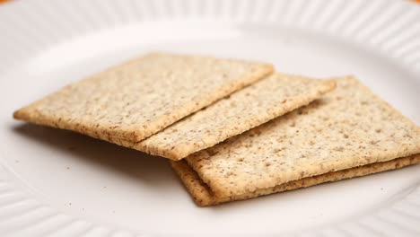 stack of wheat crackers on a plate