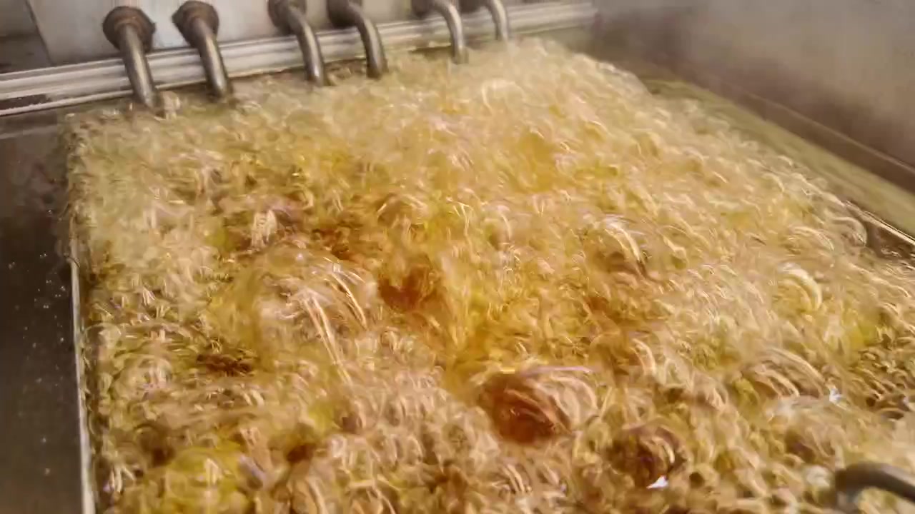 Close-Up of Food Frying in Hot Bubbling Oil