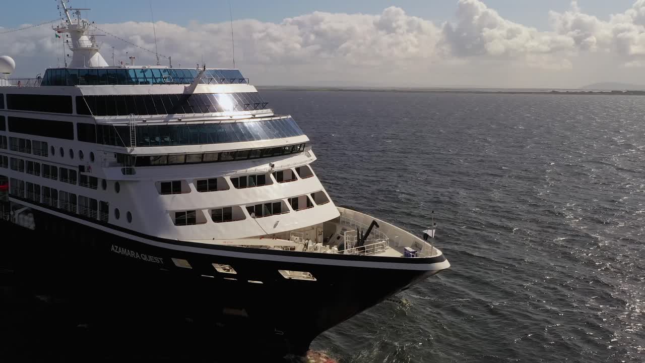 Aerial dynamic shot reveals the front of the luxurious Azamara cruise in Galway