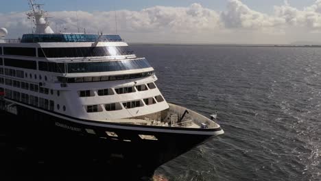 aerial dynamic shot reveals the front of the luxurious azamara cruise in galway