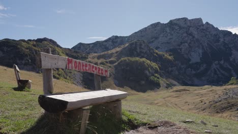 Wooden Bench in Beautiful Mountains of Montenegro with Scenic View