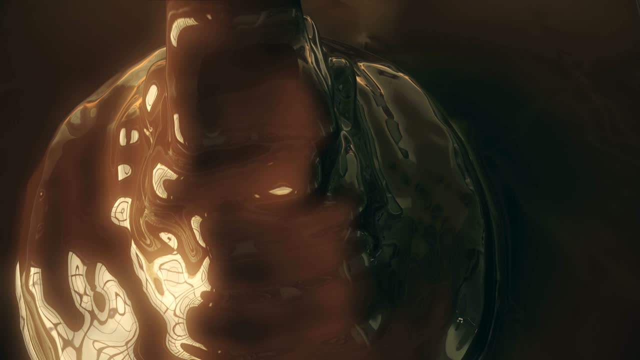 Gorgeous closeup of silky chocolate syrup as it's being poured.