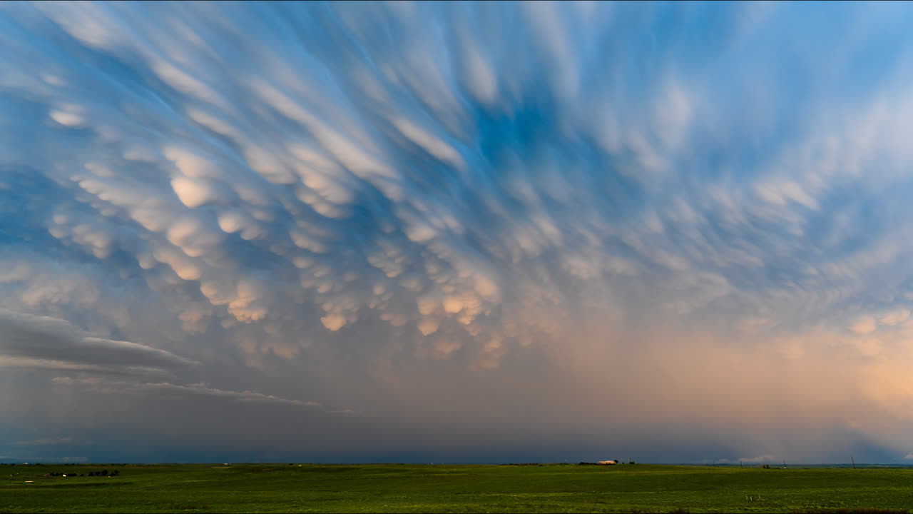 Mammatus Clouds over a Green Field
