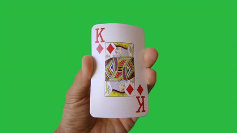 hand holding playing cards