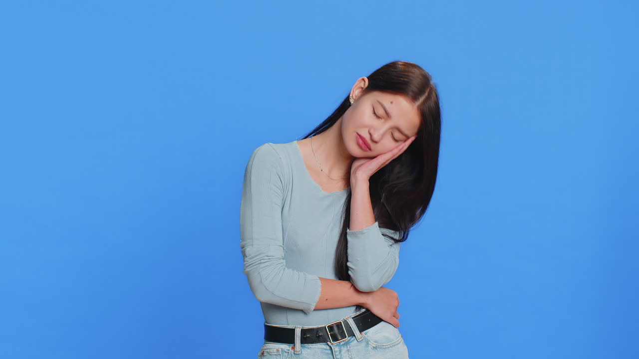 Tired sleepy young woman yawning feeling somnolent lazy bored gaping suffering from lack of sleep