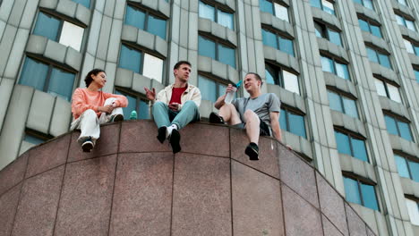 Friends-sitting-on-the-street