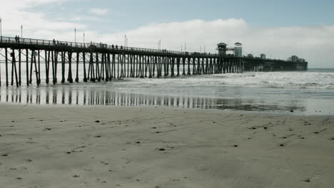 UHD footage of the historic Oceanside Pier, one of California’s longest wooden piers, stretching 1,942 feet into the Pacific Ocean—an iconic landmark since 1888, beloved by locals and visitors.