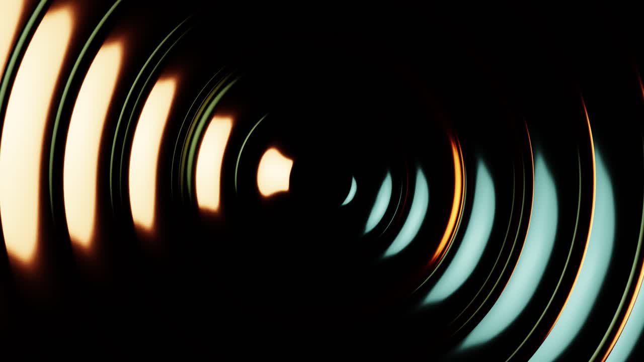 Abstract Golden and Blue Metallic Rings Pulsing on Dark Background