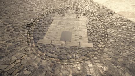 Dibujo-De-Castillo-Sobre-Piedra,-En-El-Suelo,-Arte-Empedrado,-Medina-Sidonia,-Cádiz-España