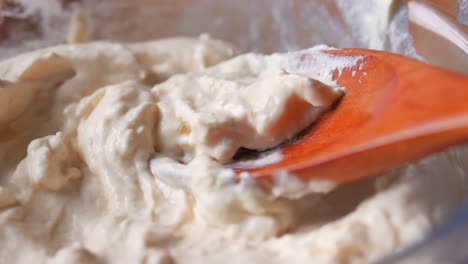 Top-view-of-milk-cream-in-a-container-on-table