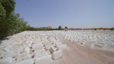 pov of a person visiting the miaara cemetery, jewish cemetery of marrakech in morocco