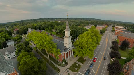 quick 360 still and pan around to the 4 churches in downtown palmyra in new york state usa