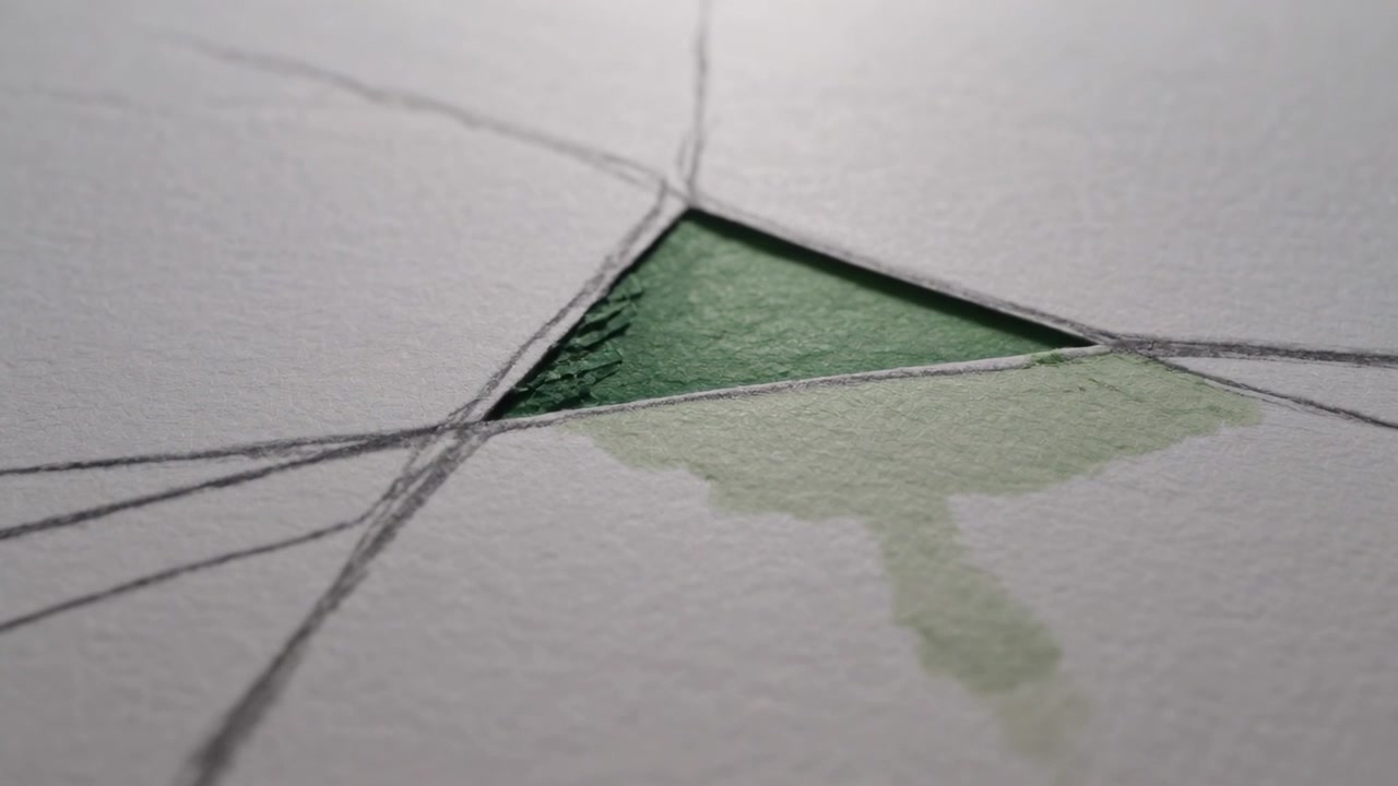 Water contacting textured watercolor paper, green pigment pooling in triangle with pencil lines