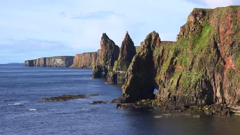 establishing shot of the beautiful duncansby head sea stacks in northern scotland 2