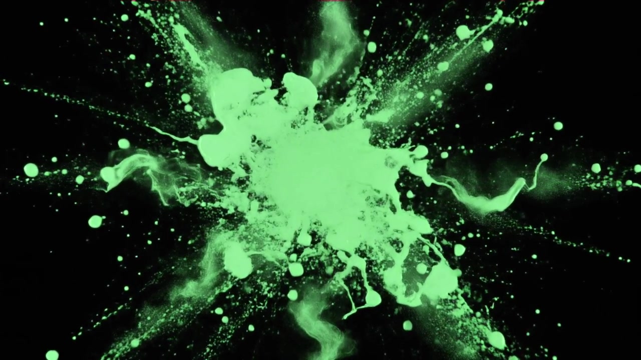 Esplosione di polvere verde sullo sfondo nero