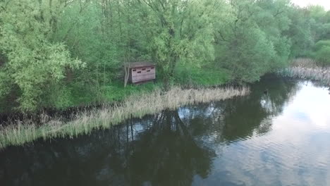 shot of a bird observation cabin in the woods