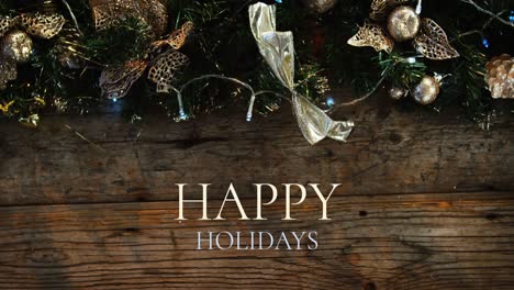 Happy-holidays-text-and-Christmas-decoration
