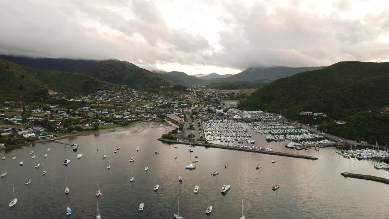 Establishing drone shot overlooking the Waikawa marina and town, in New Zealand